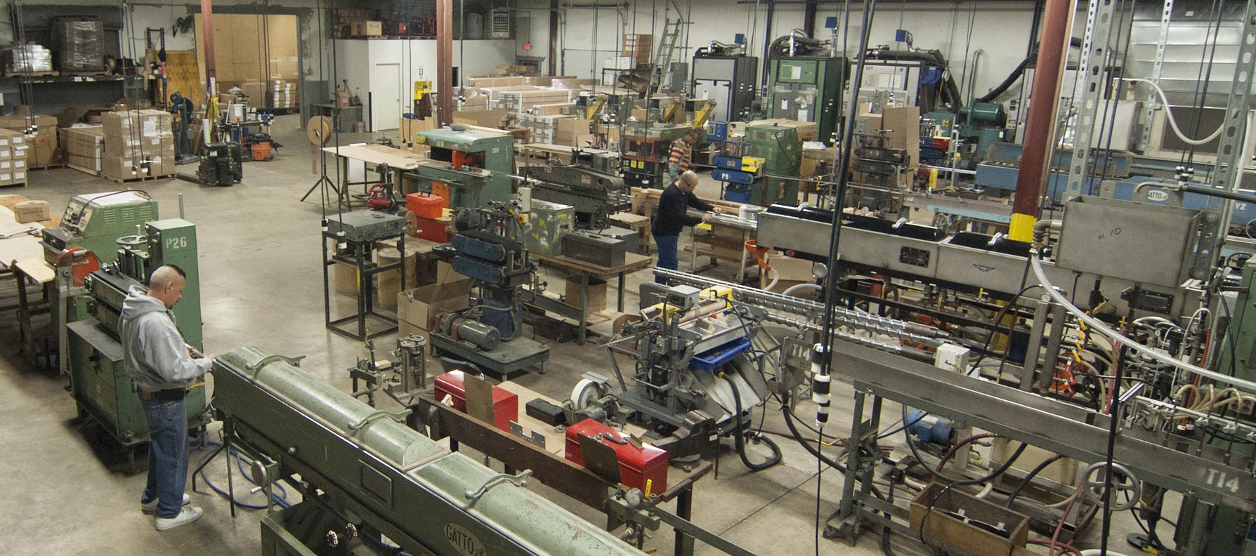 Plastic extrusion lines running on the production floor at Petro Extrusion Technologies, Middlesex, New Jersey